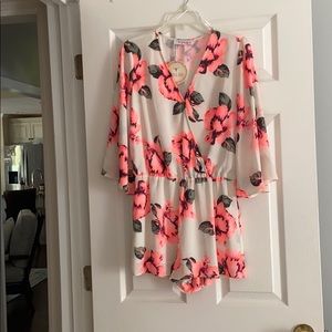 Neon and ivory floral flutter sleeve romper